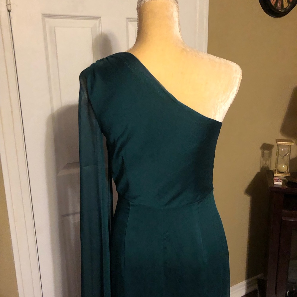 Emerald Green one shoulder dress.